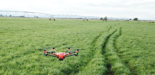 Farm Automation drone surveying grass paddock